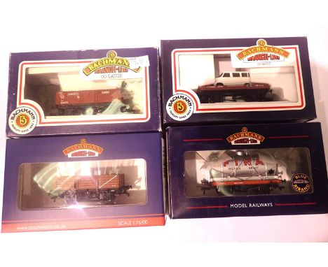 Four Bachmann wagons; China Clay, Loco Sand, Low and Transit, Fina Tanker. P&amp;P Group 1 (£14+VAT for the first lot and £1+