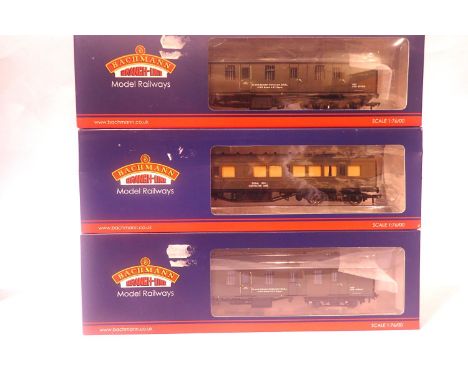 Three Bachmann coaches; 39-185 BR MK1 EX BG Departmental Olive Green x2 and a 34-253 EX LMS Comp Departmental Olive Green. P&