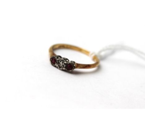 18 ct gold diamond and ruby ring, size N, 2 grams.