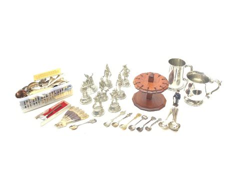 A group of seven Buckingham Pewter Military figurines, together with a collection of assorted souvenir spoons, to include mos