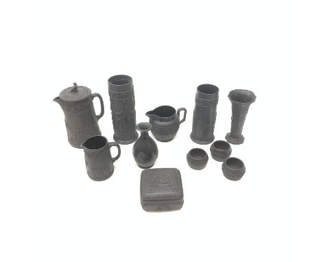 Wedgwood Basalt stoneware applied with Classical scenes comprising four vases, hot water pot, trinket box, three open salts a