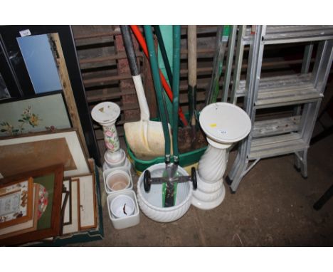 A quantity of gardening tools; jardinieres and stands etc