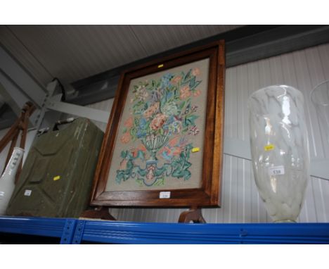 An oak framed and needle work fire screen
