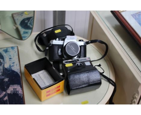 A Pentax camera and one other