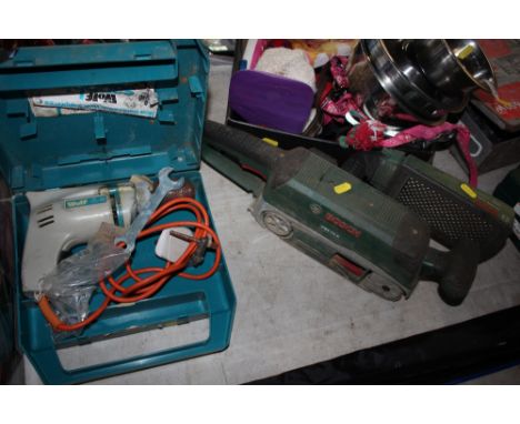 A Wolfe electrical drill in case and Bosch belt sander