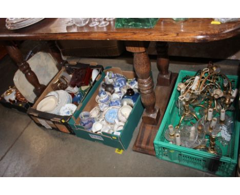 Four boxes containing various decorative china and light fittings; a Poole seal ornament; leaf plate; Poole jug etc.