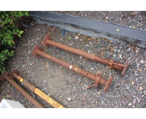 A pair of Acrow props