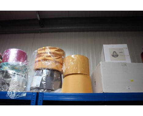 A quantity of various lamp shades