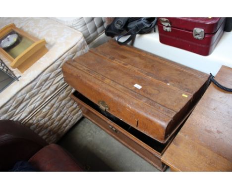 A japanned tin trunk