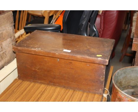 A wooden box and contents of gardening tools 