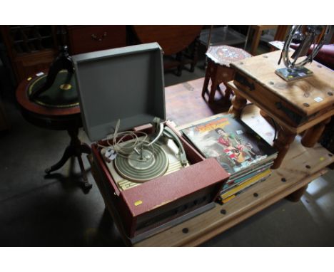 A Garrard turntable sold as collectors item with a quantity of LPs