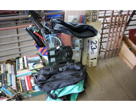 A quantity of tennis rackets; roller skates etc