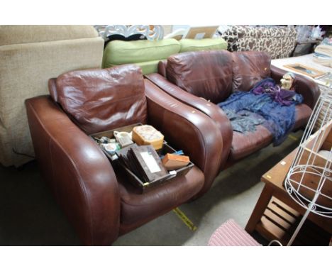 A John Lewis leather two seater sofa and matching armchair 