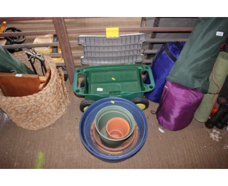 A quantity of planters and a plastic tool box