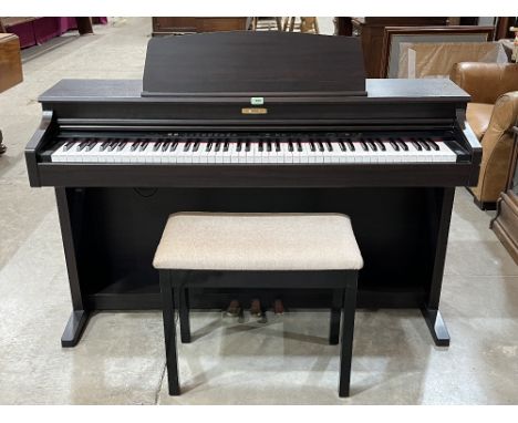 A Kawai CN31 digital piano with stool and instruction manual