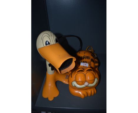 A vintage novelty telephone set of Garfield the cartoon cat and similar Duck n Dry