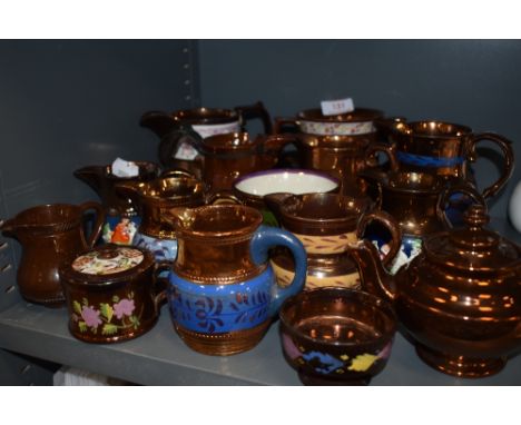 A selection of lustre ware ceramics including teapot and creamers
Three pieces ok the rest have chips and hairline cracks