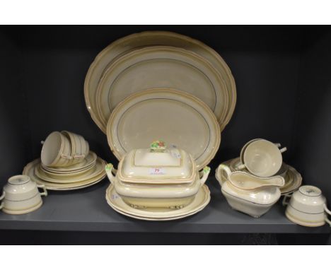 A collection of Crescent ivory, includes platters,tureen,plates,gravy boat and cups and saucers, around twenty five items.