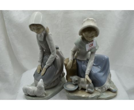 Two ceramic figure studies by Nao of girl with lamb and girl with kitten