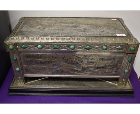 A 1930s table top casket having individual pewter panels, and green hard stone decorative detailing, these panels were sent t