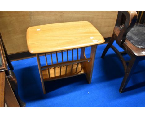 A modern Ercol magazine table, width approx. 55cm