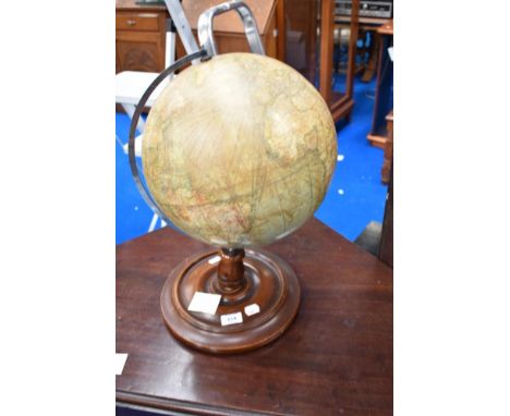 A vintage globe on stand , height approx. 45cm