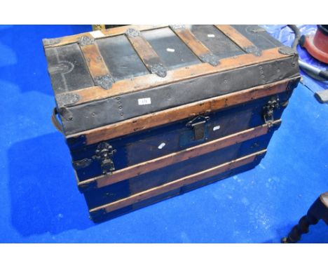 A traditional travel trunk having lined interior, dimensions approx 81 x 51 x 61cm