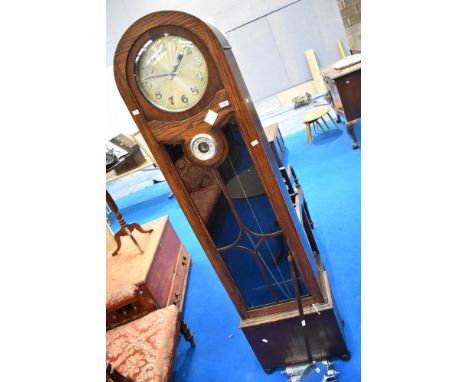 A 1930s oak longcase clock wth chrome applique numerals and barometric dial, height approx. 191cm