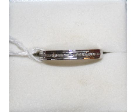 A 9ct white gold and diamond half eternity ring chanel set with single cut stones