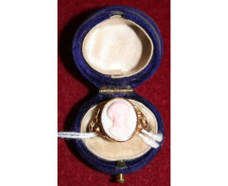 A 9ct rose gold mounted conch cameo ring, Chester 1911, depicting a classical lady, boxed