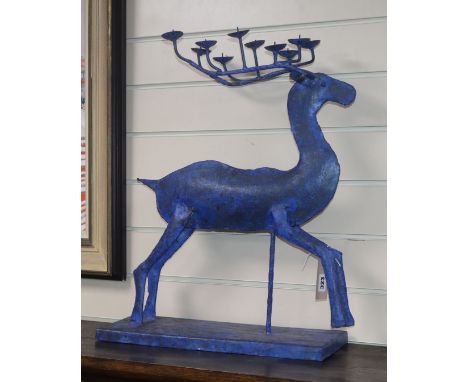 A large painted novelty stag candlestick
