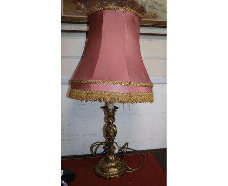 A Louis XV style ormolu candlestick, converted to a lamp