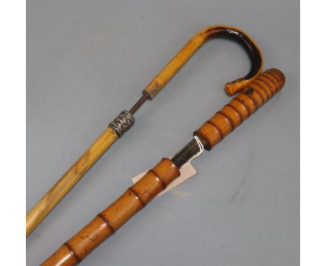 A bamboo swordstick and a cane swordstick, early 20th century