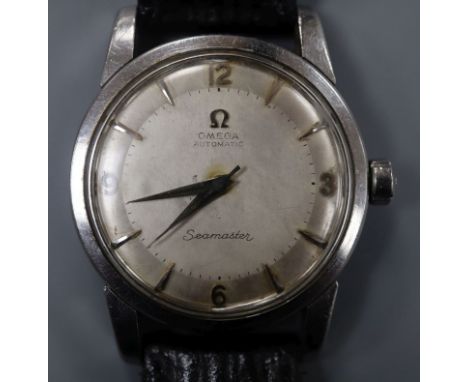 A gentleman's 1950's stainless steel Omega Seamaster automatic wrist watch, on associated leather strap, with Omega box.