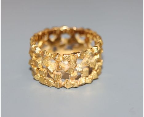 An 18ct yellow gold modernist ring by John Donald, circa 1970, size K/L.