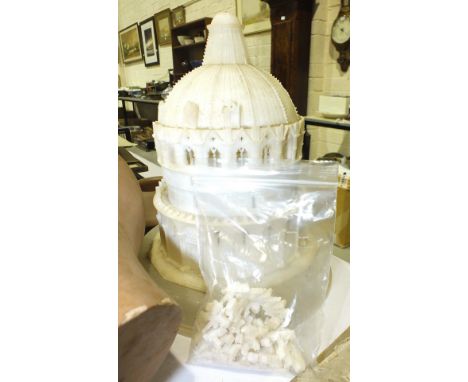 An alabaster domed building, a fibreglass male mannequin head and other items.