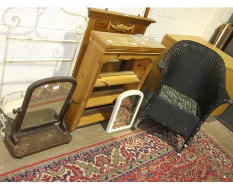 A Lloyd Loom bedroom armchair, a modern pine wall shelf, a dressing glass and other small items.