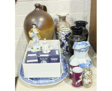 An unnamed stoneware flagon, 38cm high, two Victorian amethyst glass vases decorated with gilt and enamel dots, 25cm high, ei