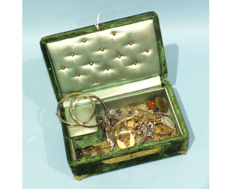 A hallmarked silver bamboo hinged bangle, two other silver bangles and a quantity of costume jewellery, badges, etc, in velve