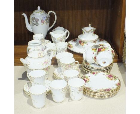Fourteen pieces of Coalport teaware decorated with flowers on trellis, no.262926, (spout chipped on teapot), nineteen pieces 