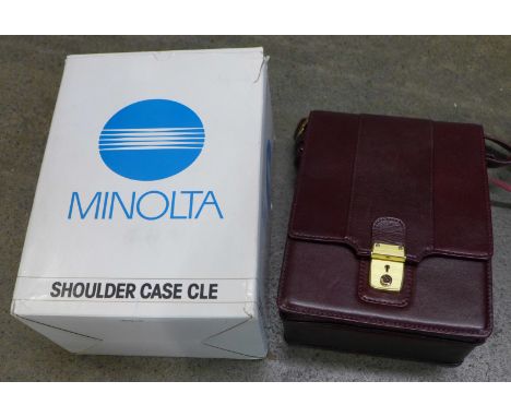 A Minolta camera shoulder carrying case CLE, with box