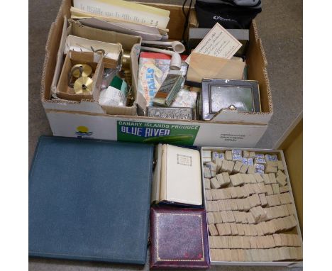 Clock parts, postage stamps, a tin box in the form of a safe, clay pipes, two William Clowes prayer books, etc.