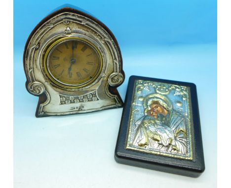 An Art Nouveau silver fronted clock, Birmingham 1910, and a silver fronted icon