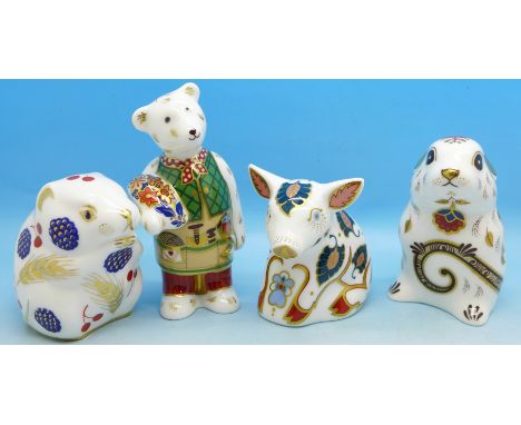 Four Royal Crown Derby paperweights, two with gold stoppers, all boxed