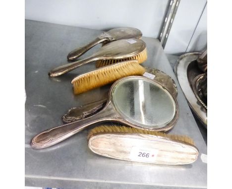 HALLMARKED SILVER BACKED DRESSING TABLE SET OF FIVE PIECES, ENGINE TURNED AND INITIALED 'M' (FAULTS) AND A HAND MIRROR, CHEST