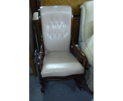 VICTORIAN MAHOGANY ROCKING CHAIR, WITH CREAM HIDE, BUTTON BACK OVER SEAT, SCROLL ARMS 