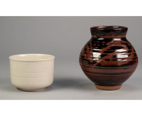 PROBABLY DEREK EMMS, STUDIO POTTERY VASE, of footed baluster form with short neck, decorate in resist with stylised design on