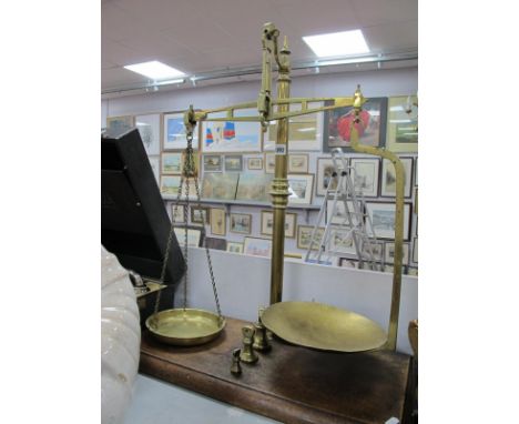 Parnall of Bristol Brass Scales, to weigh 4lb, on mahogany plinth, plus weights, 61cm wide.