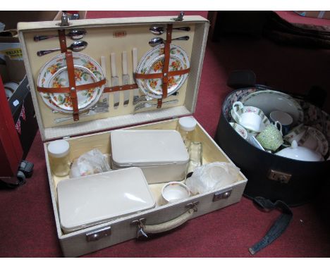 A Sirram Picnic Case, with contents (no flasks) and floral teaware etc in a vanity case. (2)