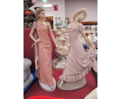 Nao Figurines of Elegant Ladies, each on oval base, 29.5cm high. (2)